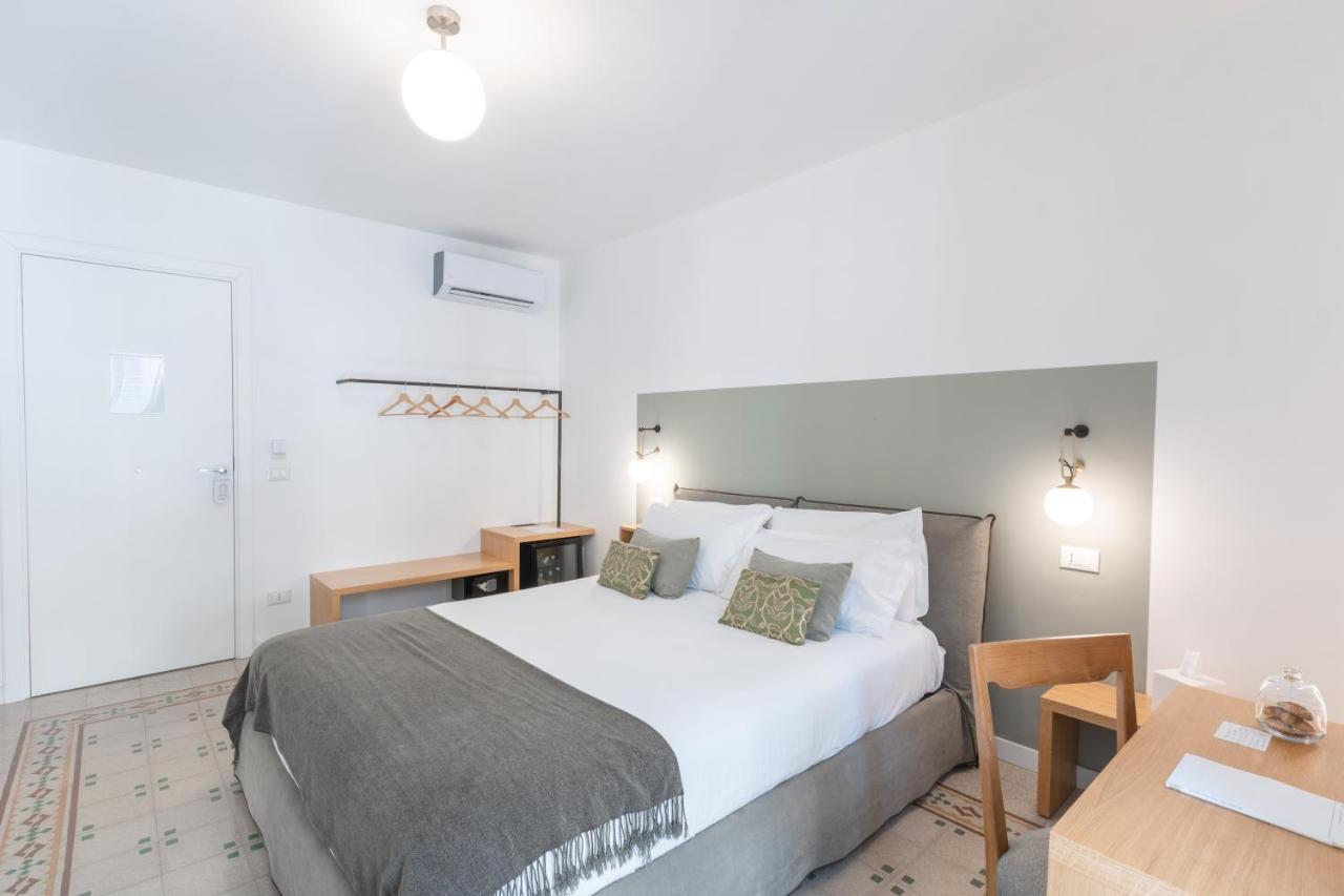 Archè Design Rooms&suites