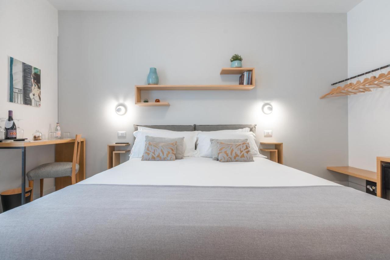 Archè Design Rooms&suites